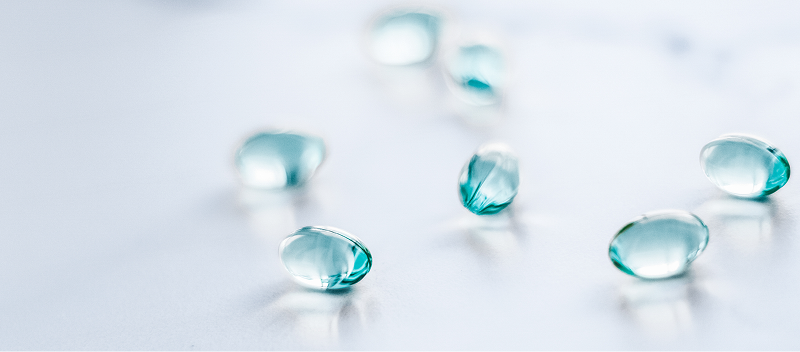 Clear blue capsules.